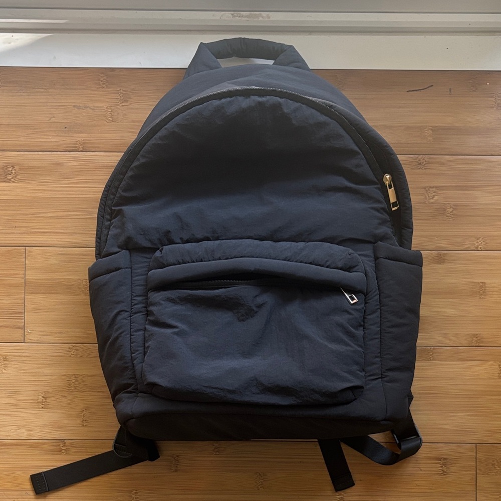 a new day Black Backpack with Gold Accents